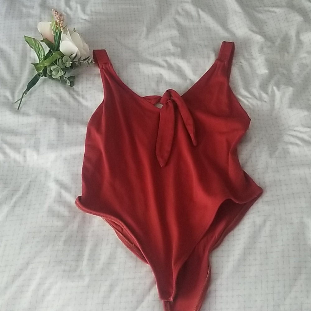 Poof New York size  LARGE bodysuit Rust color
